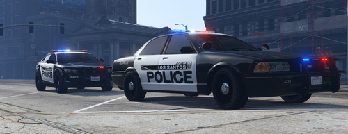 Could contain: vehicle, land vehicle, wheel, outdoor, transport, tire, law enforcement, police car, road, emergency service, ford crown victoria police interceptor, emergency vehicle, auto part, text, full-size car, police, automotive exterior, street, car, officer