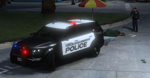 Could contain: vehicle, car, text, outdoor, land vehicle, wheel, tire, vehicle registration plate, automotive lighting, road, ground, automotive tail & brake light, street, police