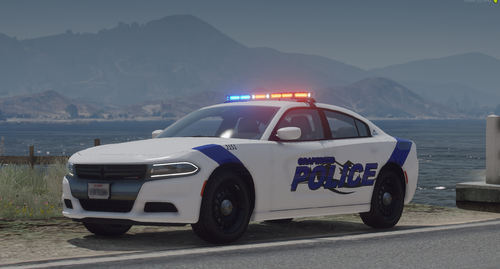 Could contain: vehicle, land vehicle, outdoor, wheel, tire, bumper, transport, police car, automotive light bulb, auto part, full-size car, road, police, mountain, car