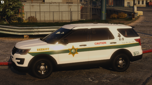 Could contain: vehicle, land vehicle, wheel, outdoor, transport, tire, text, emergency vehicle, police car, emergency service, police, auto part, motor vehicle, ford, vehicle registration plate, automotive exterior, law enforcement, road, car, street, parked, emergency