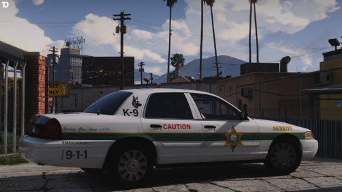 Could contain: vehicle, land vehicle, outdoor, wheel, sky, text, transport, full-size car, vehicle registration plate, sedan, car, ford crown victoria police interceptor, police car, police, tire, law enforcement, road, parked, street