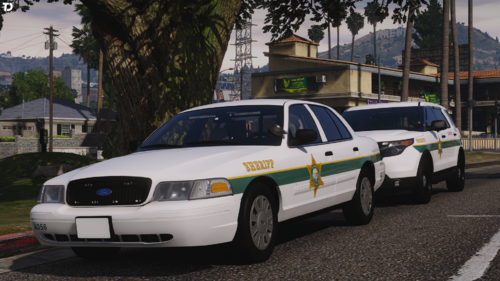 Could contain: vehicle, land vehicle, outdoor, wheel, transport, full-size car, car, law enforcement, police car, police, ford crown victoria police interceptor, sedan, text, street, parked