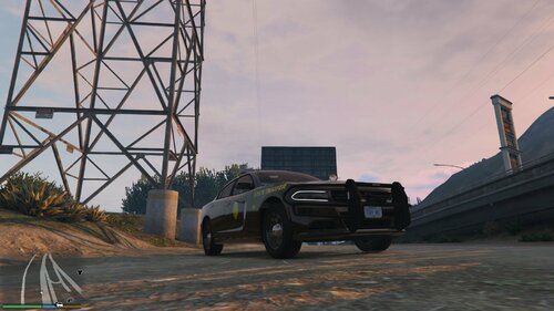 Could contain: sky, vehicle, outdoor, wheel, land vehicle, car, tire, military vehicle, ground, tower