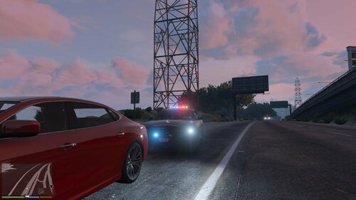 Could contain: sky, outdoor, vehicle, land vehicle, wheel, automotive design, cloud, road, red, luxury vehicle, auto part, sports car, ground, car, automotive, light