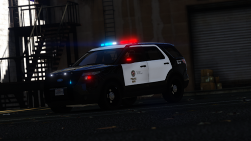 Could contain: vehicle, land vehicle, wheel, outdoor, transport, tire, building, road, auto part, police car, automotive tail & brake light, automotive lighting, automotive exterior, light, car, police, street