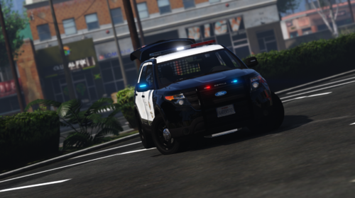 Could contain: vehicle, land vehicle, wheel, outdoor, tire, road, car, automotive design, auto part, motorsport, building, transport, street, blue