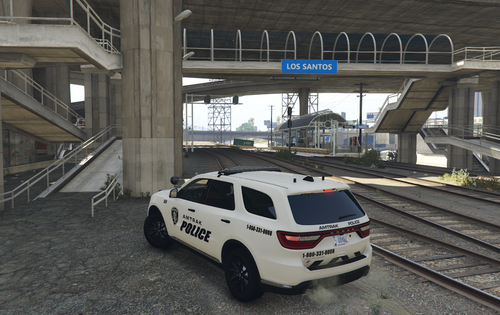 Could contain: vehicle, land vehicle, wheel, building, tire, outdoor, transport, auto part, ground, parked, track, car