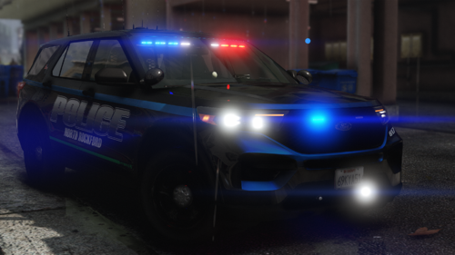 Could contain: vehicle, land vehicle, wheel, tire, transport, auto part, car, automotive exterior, automotive lighting, outdoor, text, bumper, automotive light bulb, automotive tail & brake light, automotive side marker light, police car, road, blue, light, ground, parked, police, night