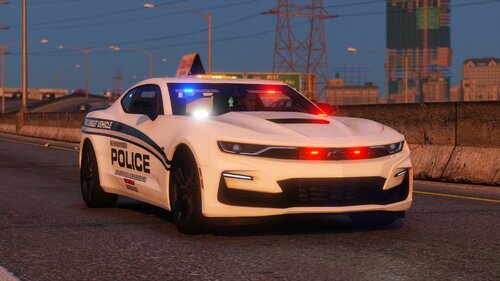 Could contain: land vehicle, vehicle, wheel, outdoor, sports car, road, automotive design, performance car, tire, sports sedan, motorsport, auto part, car, street, light, police