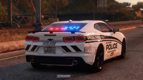 Could contain: vehicle, land vehicle, wheel, outdoor, sports car, text, tire, auto part, performance car, road, automotive design, automotive light bulb, sports sedan, bumper, full-size car, spoiler, motorsport, transport, police car, mid-size car, ground, car