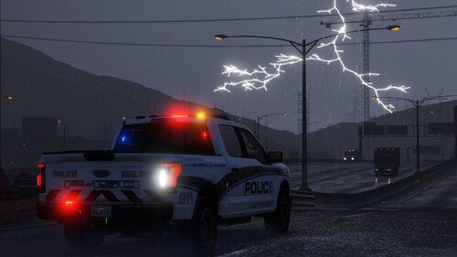 Could contain: vehicle, land vehicle, sky, outdoor, wheel, car, auto part, tire, road, street, light, night