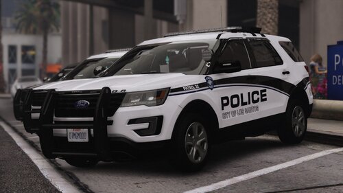 Could contain: land vehicle, vehicle, wheel, text, tire, transport, outdoor, bumper, auto part, police car, law enforcement, sport utility vehicle, ford, car, vehicle registration plate, mitsubishi, road, police, compact sport utility vehicle, ford motor company, automotive exterior, full-size car, motor vehicle, street, emergency