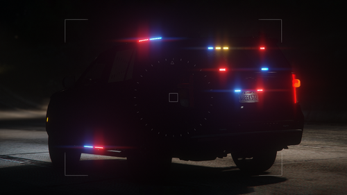 Could contain: vehicle, land vehicle, tire, car, outdoor, wheel, auto part, automotive lighting, automotive tail & brake light, transport, automotive exterior, motor vehicle, light, ground, truck, night