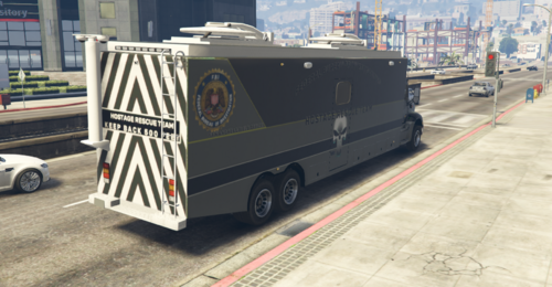 Could contain: wheel, vehicle, land vehicle, outdoor, transport, building, road, van, ground, car, mode of transport, tire, street, parked, city