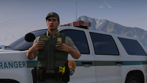 Could contain: vehicle, outdoor, person, sky, land vehicle, clothing, wheel, law enforcement, man, tire, automotive luggage rack, police, car, mountain, van, transport