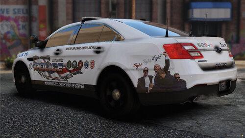 Could contain: vehicle, land vehicle, wheel, text, tire, outdoor, mid-size car, car, transport, full-size car, auto part, bumper, police car, automotive light bulb, road, automotive exterior, automotive design, police, parked