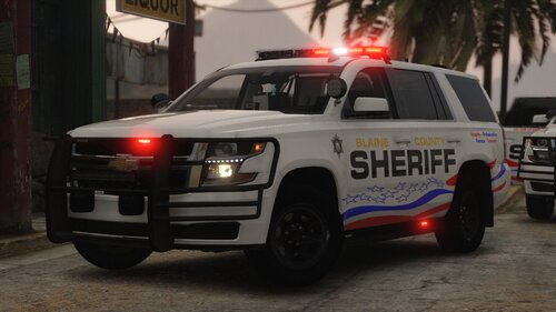 Could contain: vehicle, land vehicle, wheel, tire, transport, text, outdoor, auto part, law enforcement, vehicle registration plate, emergency service, police car, emergency vehicle, bumper, sport utility vehicle, automotive exterior, emergency, police, parked, street, car