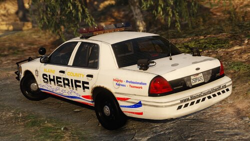 Could contain: vehicle, land vehicle, outdoor, text, wheel, transport, car, tire, rally, full-size car, police car, vehicle registration plate, motorsport, sedan, grass, ground