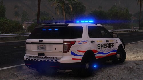 Could contain: vehicle, land vehicle, transport, wheel, text, outdoor, emergency vehicle, emergency service, police car, law enforcement, emergency, tire, ford, police, auto part, car, vehicle registration plate, police van, road, van, street, driving, ground