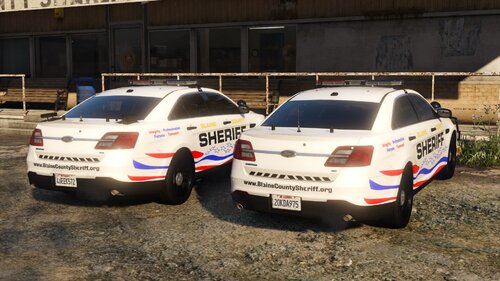 Could contain: vehicle, land vehicle, text, wheel, outdoor, police car, tire, full-size car, police, law enforcement, auto part, car, emergency service, ground, parked