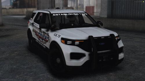 Could contain: land vehicle, vehicle, tire, wheel, bumper, police, transport, auto part, outdoor, automotive tire, ford, sport utility vehicle, fender, automotive exterior, police car, car, ground