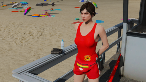 Could contain: clothing, person, outdoor, ground, swimwear, beach, woman, wearing