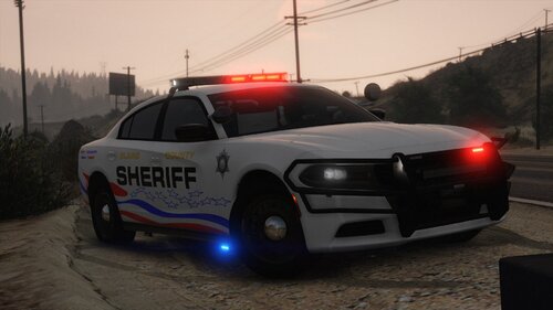 Could contain: land vehicle, vehicle, outdoor, wheel, transport, sky, tire, police car, law enforcement, auto part, full-size car, bumper, text, ford, emergency service, ford crown victoria police interceptor, automotive light bulb, road, car, police, light, emergency