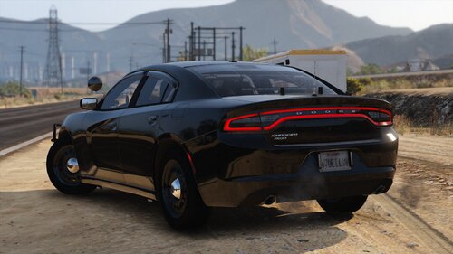 Could contain: vehicle, land vehicle, wheel, outdoor, sky, tire, ground, automotive design, auto part, hood, sports car, mid-size car, bumper, luxury vehicle, car, mountain, road, black