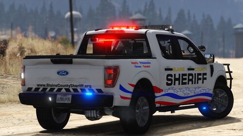 Could contain: vehicle, land vehicle, wheel, transport, tire, outdoor, text, auto part, automotive tire, bumper, emergency vehicle, emergency service, automotive exterior, car, law enforcement, ford, police car, roof rack, pickup truck, road, police, ground, truck