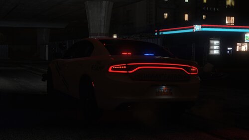 Could contain: vehicle, land vehicle, building, car, wheel, automotive lighting, auto part, automotive tail & brake light, night, outdoor, light, street, dark