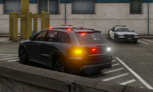 Could contain: land vehicle, vehicle, wheel, outdoor, road, tire, vehicle registration plate, automotive lighting, building, automotive tail & brake light, transport, auto part, sedan, automotive exterior, mid-size car, automotive parking light, automotive side marker light, car, street, light, ground, police, stop