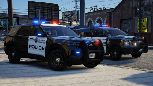 Could contain: vehicle, land vehicle, wheel, text, outdoor, law enforcement, tire, police car, transport, emergency service, emergency vehicle, auto part, vehicle registration plate, automotive exterior, ford, police, car, street, emergency