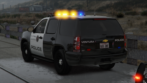 Could contain: vehicle, land vehicle, transport, outdoor, wheel, tire, text, vehicle registration plate, car, auto part, minivan, road, motor vehicle, compact van, ford, automotive tail & brake light, van, light commercial vehicle, automotive luggage rack, police, street, light