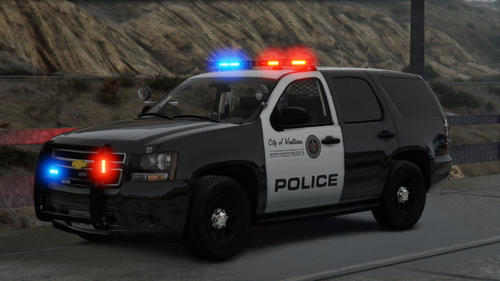 Could contain: vehicle, land vehicle, transport, outdoor, wheel, car, emergency service, law enforcement, auto part, emergency vehicle, police car, tire, road, emergency, vehicle registration plate, motor vehicle, text, ford, van, light, driving, street, police