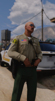 Could contain: clothing, sky, person, outdoor, vehicle, land vehicle, wheel, man, trousers, cloud, tire, car, ground, military uniform, uniform, standing, wearing, military