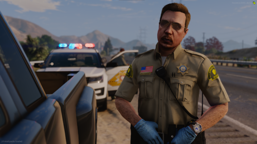 Could contain: clothing, person, sky, outdoor, vehicle, man, human face, car, land vehicle, mountain