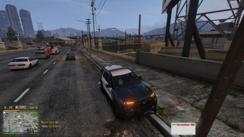 Could contain: land vehicle, outdoor, vehicle, sky, car, wheel, road, ground, street, track, city