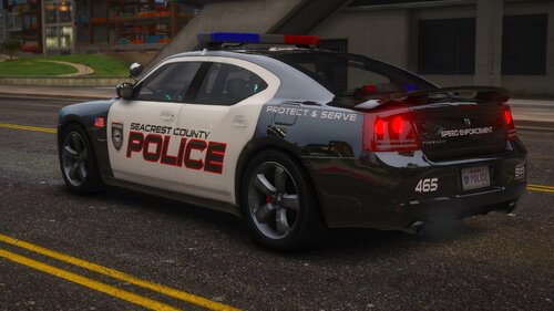 Could contain: vehicle, land vehicle, text, wheel, tire, transport, auto part, full-size car, vehicle registration plate, mid-size car, outdoor, sports sedan, road, police car, alloy wheel, car, rim, automotive tail & brake light, bumper, automotive light bulb, law enforcement, automotive exterior, police, sedan, street