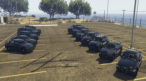 Could contain: outdoor, sky, vehicle, tire, land vehicle, wheel, ground, tree, parking, road, auto part, parked, car, parking lot