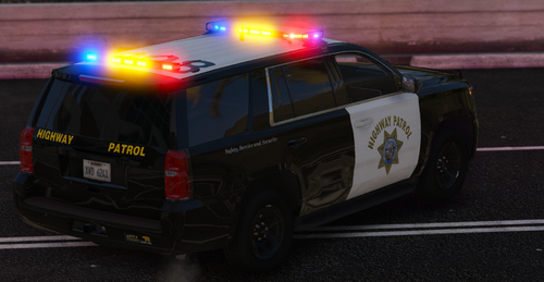 Could contain: vehicle, land vehicle, text, wheel, road, outdoor, car, automotive exterior, law enforcement, emergency service, vehicle registration plate, transport, auto part, automotive tail & brake light, police car, tire, emergency vehicle, automotive lighting, police, street, light, emergency