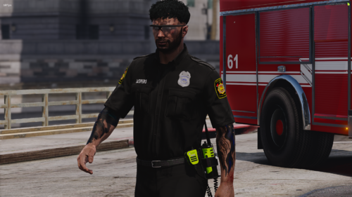 Could contain: clothing, person, firefighter, outdoor, man, wheel, vehicle, land vehicle, ground, street